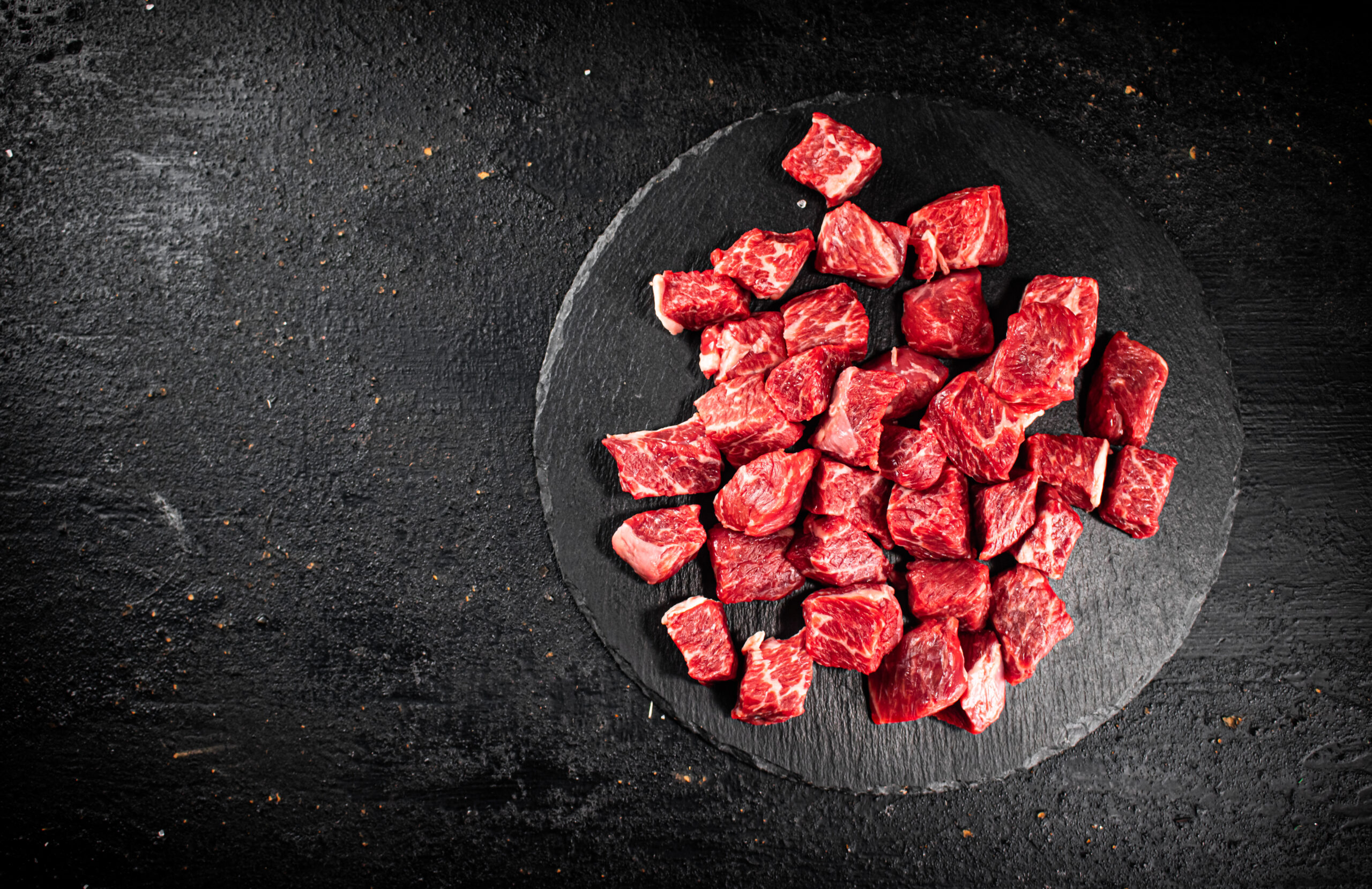 Homemade High-Value Dog Treats | The Not So Secret Recipe - Pieces Of Raw Beef On A Stone Board 2024 09 18 23 59 12 Utc Scaled Homemade High-Value Dog Treats | The Not So Secret Recipe